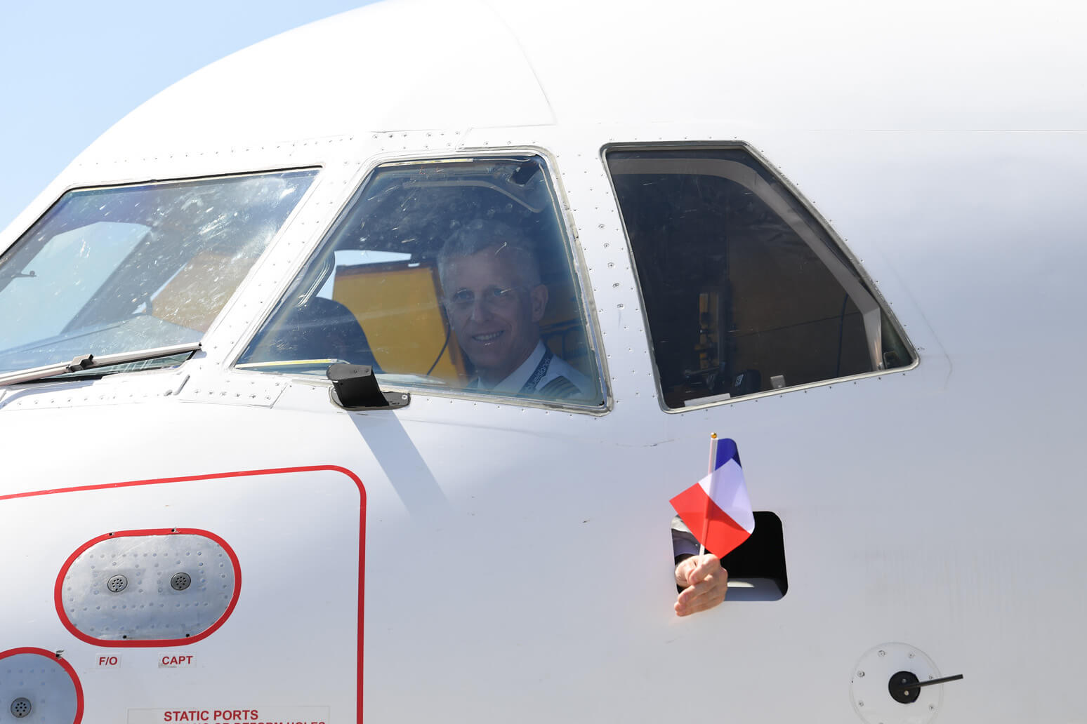 Captain waving before first Paris flight