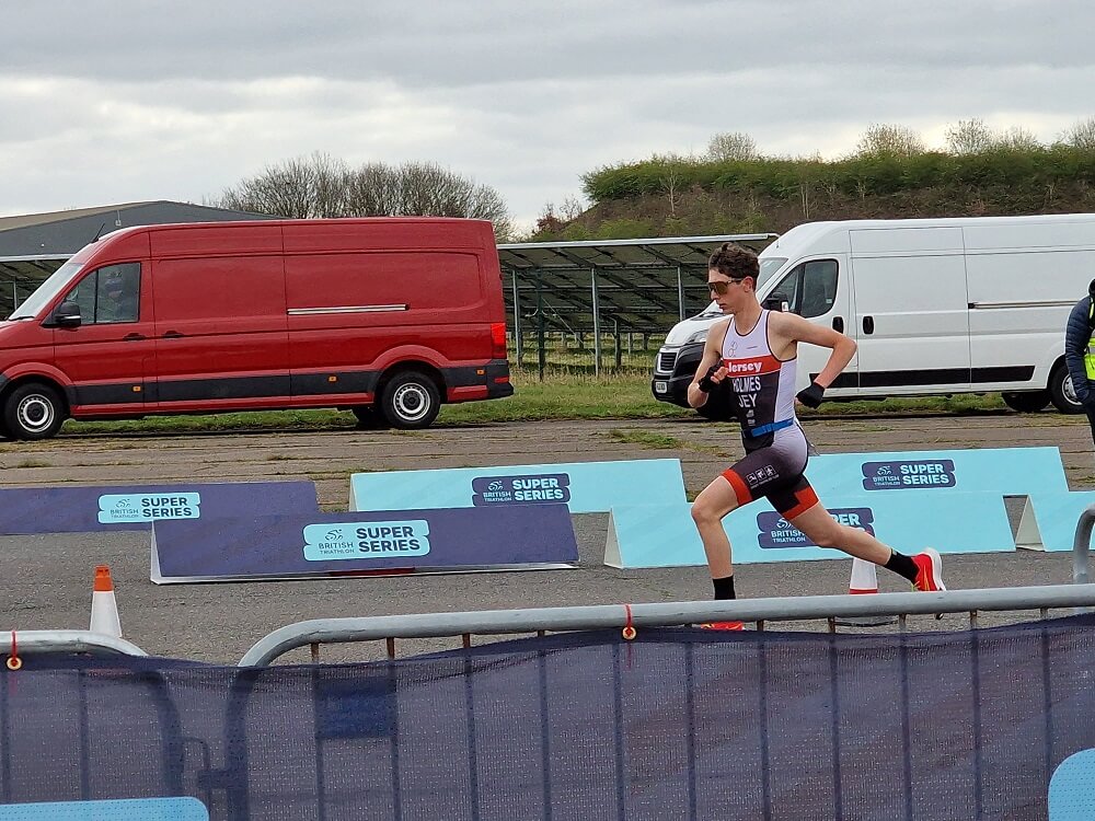 Luke Holmes flight funding triathlon